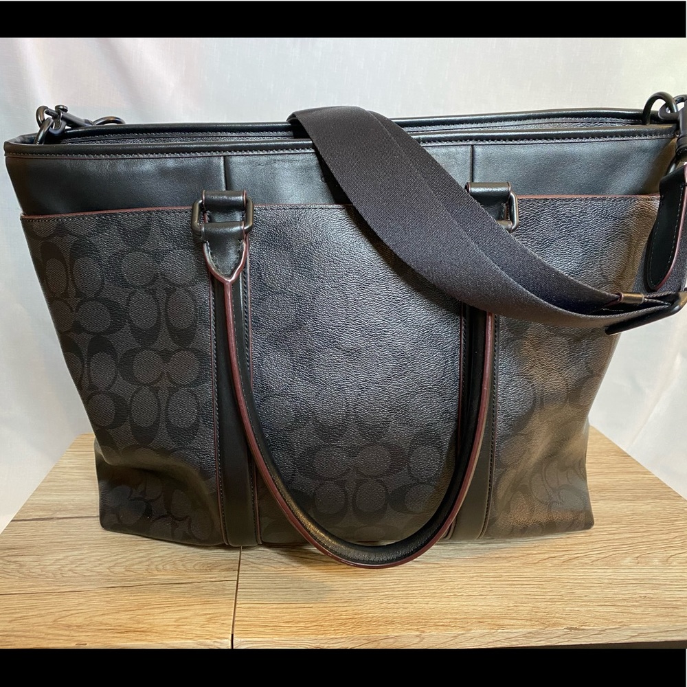 Coach tote with top zipper.
